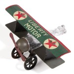 The Liberty Motors Candy Container is a wonderful example of Westmoreland's design ingenuity. The wings and nose both come off and candy was placed inside of the fuselage..